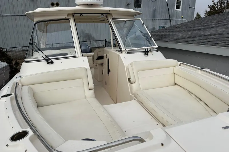 Slide: The Image of 2022 Grady-White 325 Freedom boat with spacious seating and sleek design. - 14