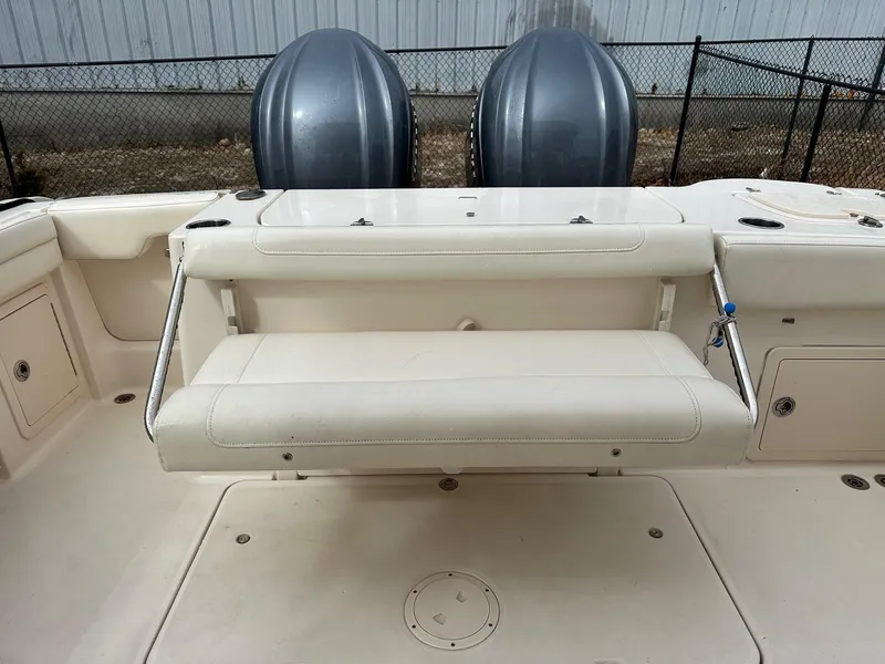 Slide: The Image of 2022 Grady-White 325 Freedom boat with dual engines and foldable seating. - 15