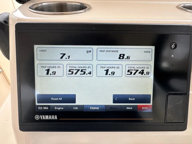 Slide: The Image of Yamaha display on 2022 Grady-White 325 Freedom showing fuel usage and trip data. - 4