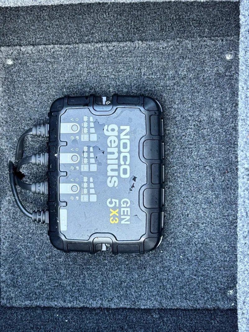 Slide: The Image of NOCO Genius GEN 5X3 charger installed on 2024 Tracker Pro Team 195 TXW Tournament Edition boat. - 8