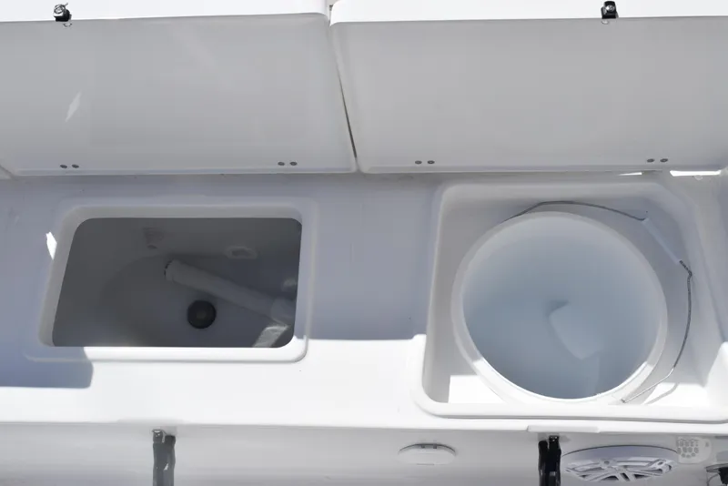 Slide: The Image of 2025 Sea Hunt Ultra 235 SE boat storage compartments and features. - 20