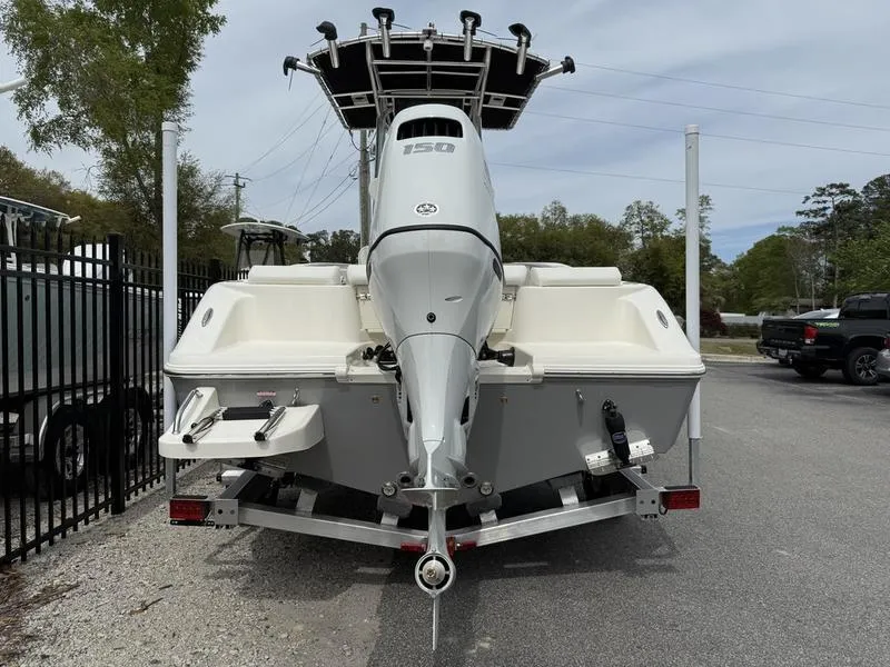 Slide: The Image of 2025 Bulls Bay 200 CC boat with powerful outboard motor, parked on a trailer. - 3