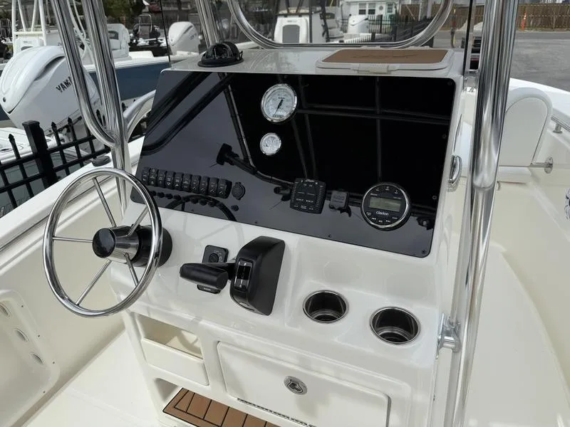 Slide: The Image of 2025 Bulls Bay 200 CC boat console with Garmin navigation system and control panel. - 4