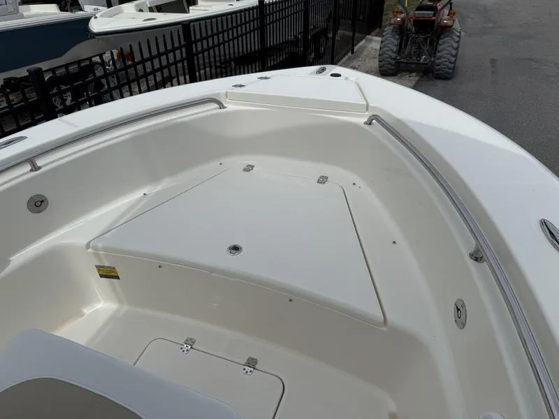 Slide: The Image of 2025 Bulls Bay 200 CC boat dashboard with steering wheel and control panel. - 7