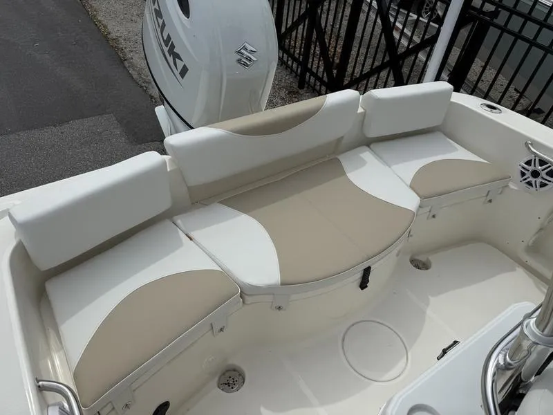 Slide: The Image of 2025 Bulls Bay 200 CC boat dashboard with steering wheel and control panel. - 8