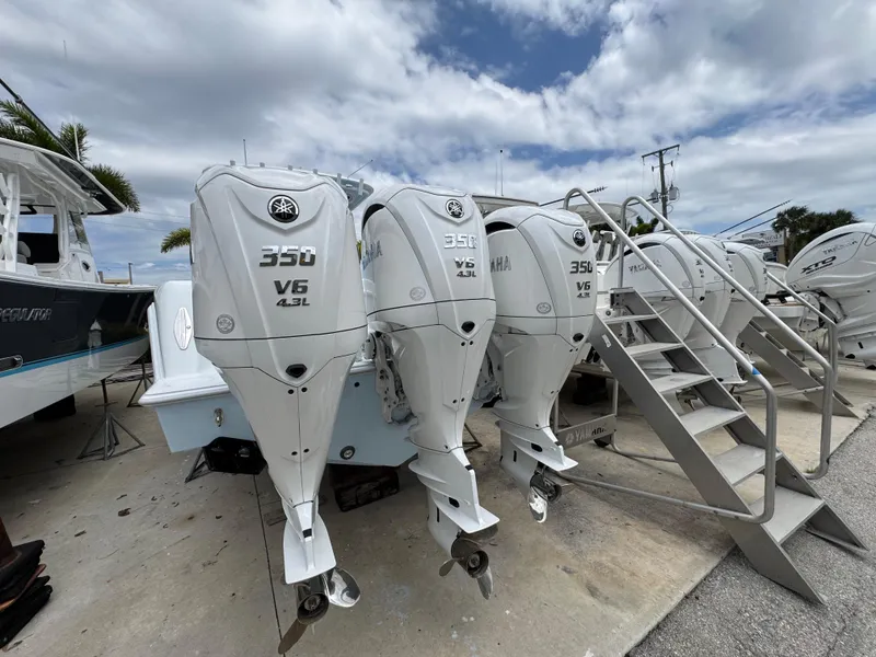 Slide: The Image of 2025 Contender 35 ST boat with triple Yamaha 350 V6 outboard engines. - 11