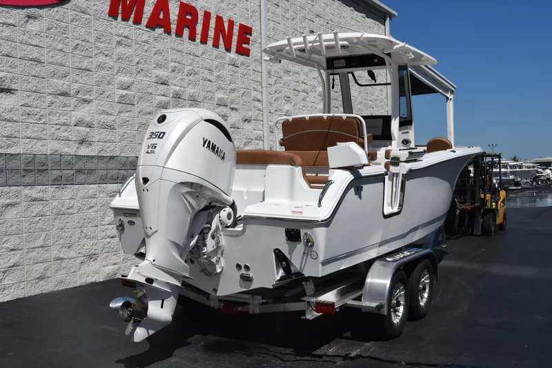 Slide: The Image of 2025 Sea Hunt Ultra 255 SE boat with Yamaha 350 engine on trailer. - 3
