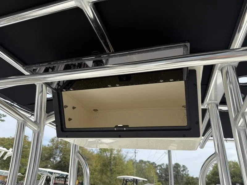 Slide: The Image of 2025 Bulls Bay 2200 XS boat console with storage compartment, featuring sleek metal framework. - 10