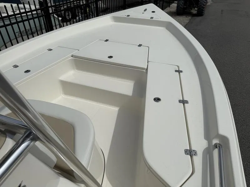 Slide: The Image of 2025 Bulls Bay 2200 XS boat deck with storage compartments and seating. - 5