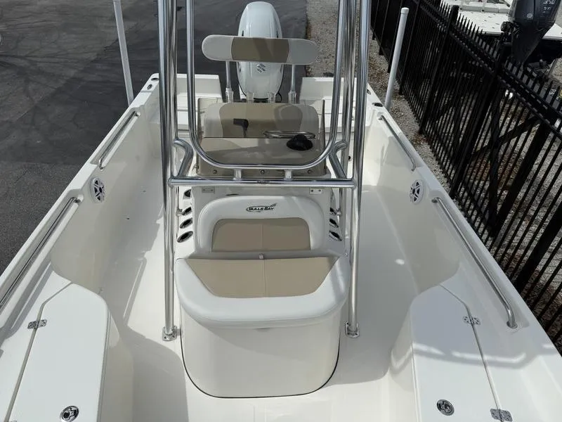 Slide: The Image of 2025 Bulls Bay 2200 XS boat interior with seating and console, viewed from above. - 7