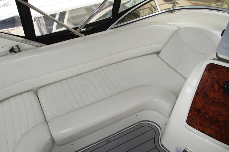 Slide: The Image of Luxurious white seating on 2004 Meridian 340 yacht interior. - 18