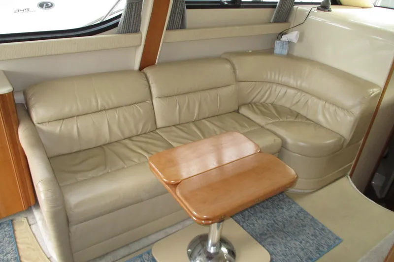 Slide: The Image of Luxurious beige leather seating in 2004 Meridian 340 yacht interior. - 27