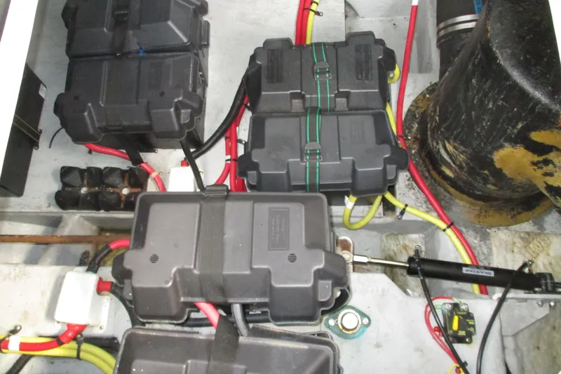 Slide: The Image of Electrical system of a 2004 Meridian 340 boat with battery boxes and wiring. - 34