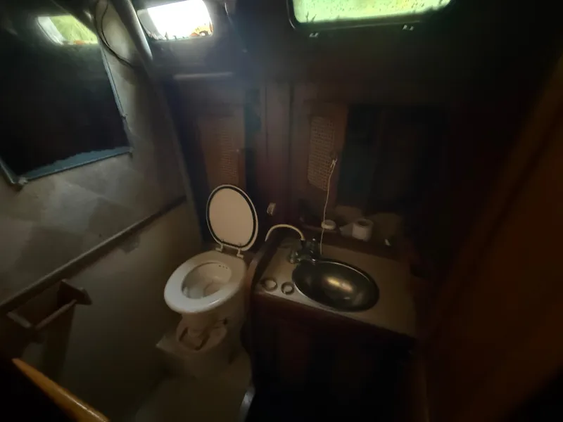 Slide: The Image of Small boat bathroom with toilet and sink, S2 11A model, 1981. - 48