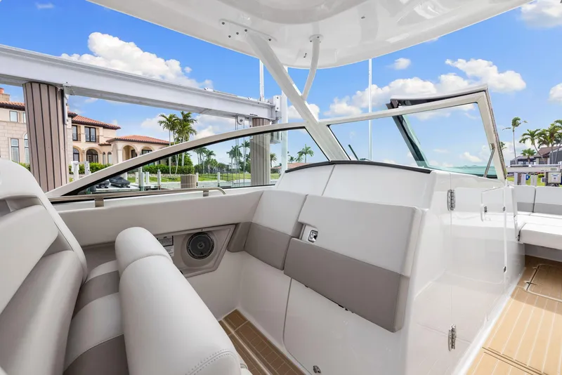 Slide: The Image of 2022 Boston Whaler 320 Vantage interior with luxurious seating and modern design. - 17