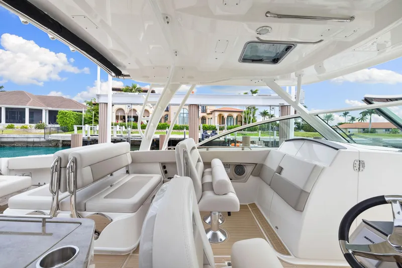 Slide: The Image of 2022 Boston Whaler 320 Vantage boat interior with luxurious seating and modern design. - 25