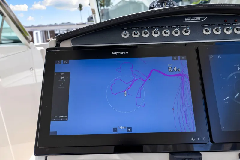 Slide: The Image of Navigation display on 2022 Boston Whaler 320 Vantage boat, showing route and speed. - 31