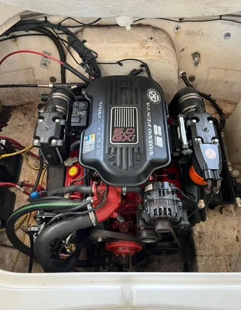 Slide: The Image of Engine compartment of a 2007 Chaparral Sunesta 234 boat, featuring a Volvo Penta 8.1 GXI engine. - 4