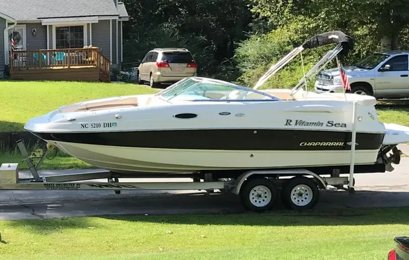 Slide: The Image of 2007 Chaparral Sunesta 234 boat on trailer in residential driveway. - 8