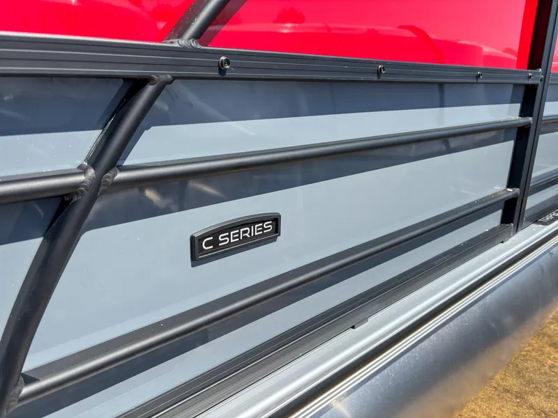 Slide: The Image of 2025 Trifecta 22RF CS pontoon boat, C Series badge, red and gray exterior. - 5