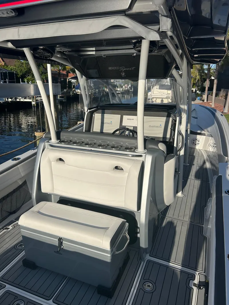 Slide: The Image of 2018 Nor-Tech 340 Sport boat with sleek design and spacious seating. - 26