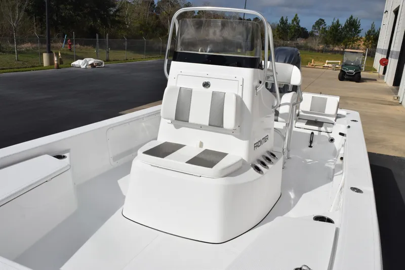 Slide: The Image of 2025 Frontier 2104 boat with sleek white design and modern console. - 12