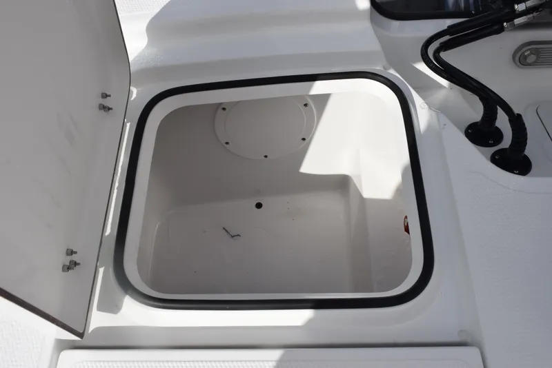 Slide: The Image of Open storage compartment on a 2025 Frontier 2104 boat, showcasing interior space. - 20