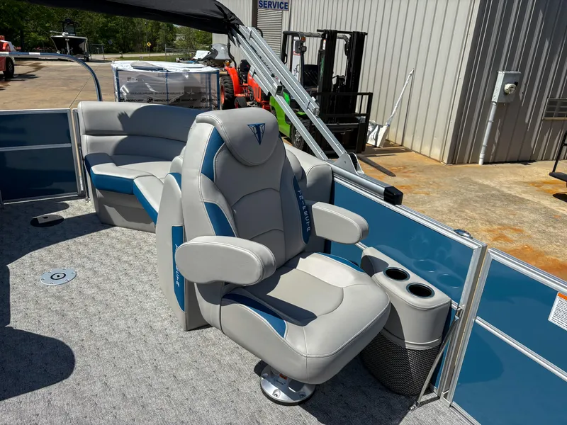Slide: The Image of 2025 Trifecta 22 RF LE boat interior with plush seating and modern design. - 10