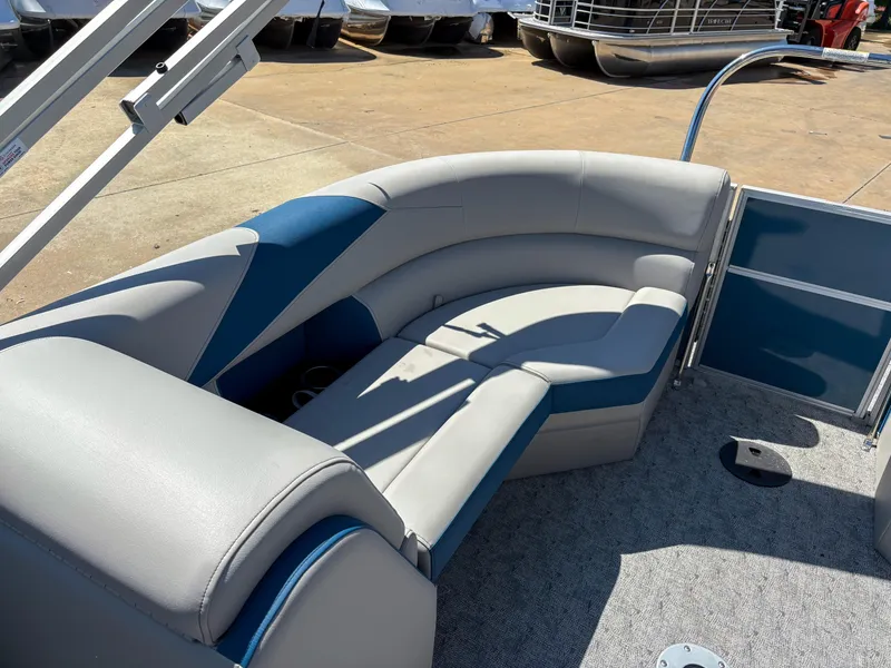 Slide: The Image of 2025 Trifecta 22 RF LE boat with gray and blue seating on deck. - 12