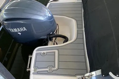 Slide: The Image of 2022 Chaparral 267 SSX OB boat with Yamaha outboard motor, gray deck. - 23
