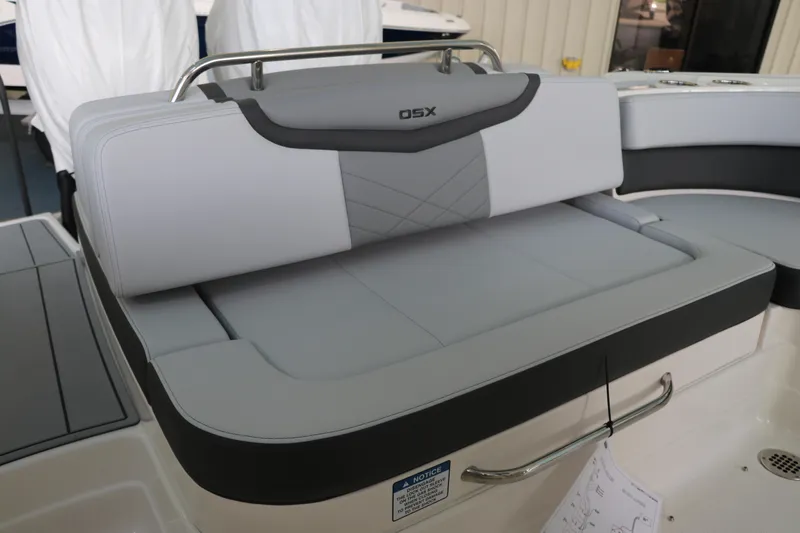 Slide: The Image of 2025 Chaparral 280 OSX boat seat with gray upholstery and sleek design. - 13