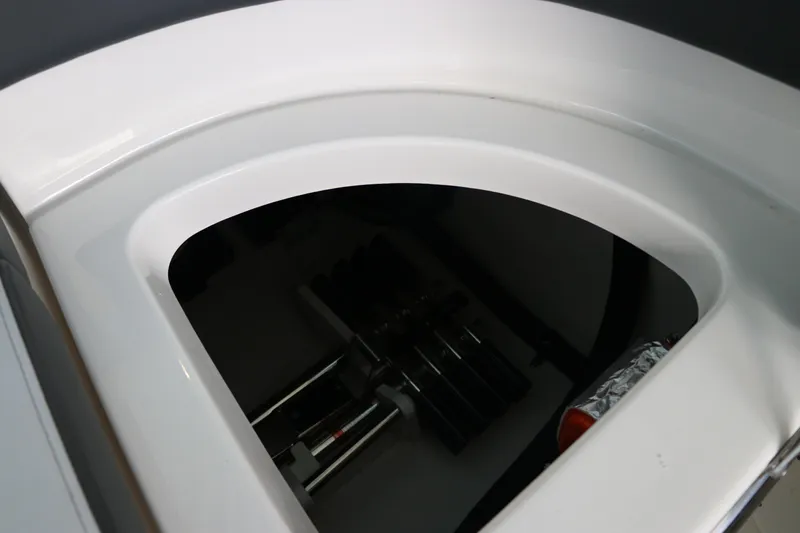 Slide: The Image of Engine compartment of 2025 Chaparral 280 OSX boat, showcasing interior components. - 16