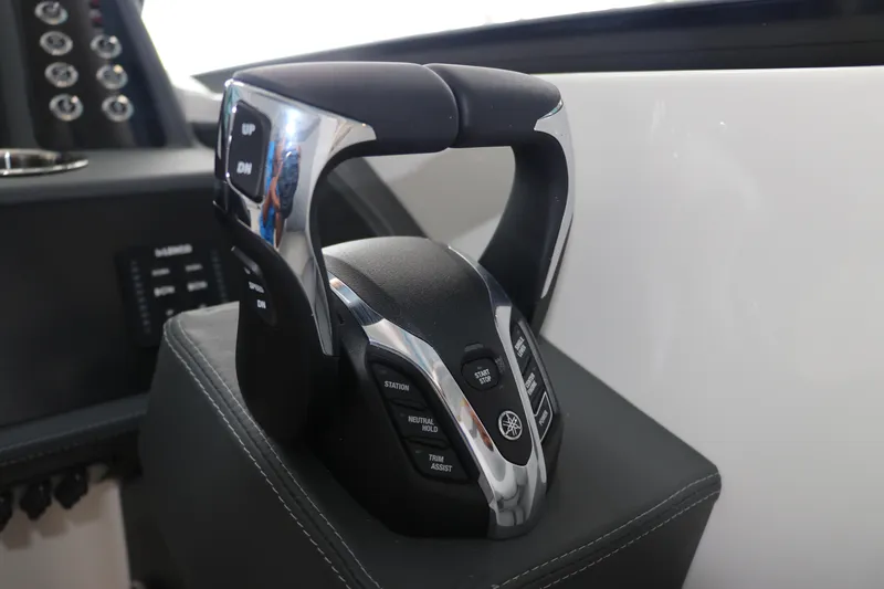 Slide: The Image of Control panel of 2025 Chaparral 280 OSX boat, featuring advanced throttle system. - 31