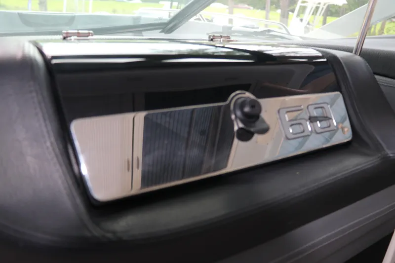 Slide: The Image of Dashboard of 2025 Chaparral 280 OSX boat with sleek design and modern controls. - 33