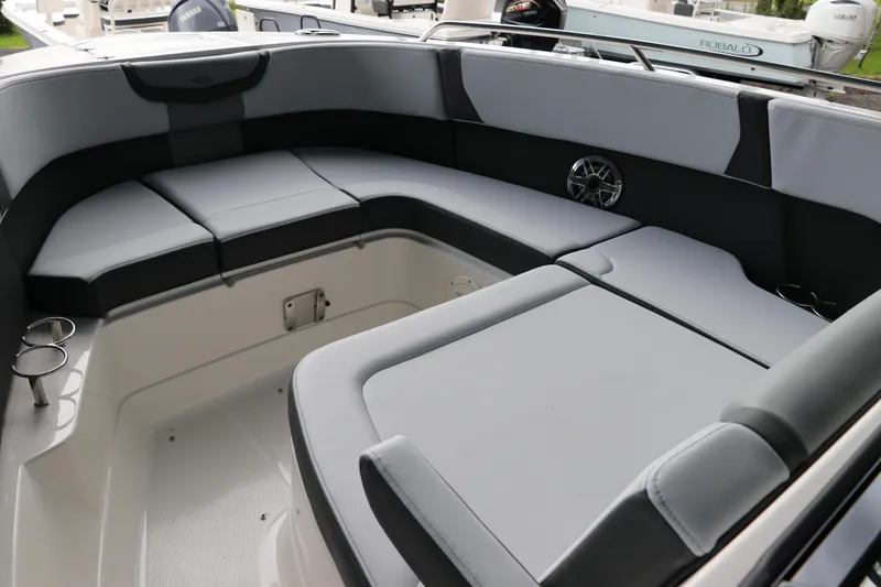 Slide: The Image of 2025 Chaparral 280 OSX boat interior with spacious seating and modern design. - 43