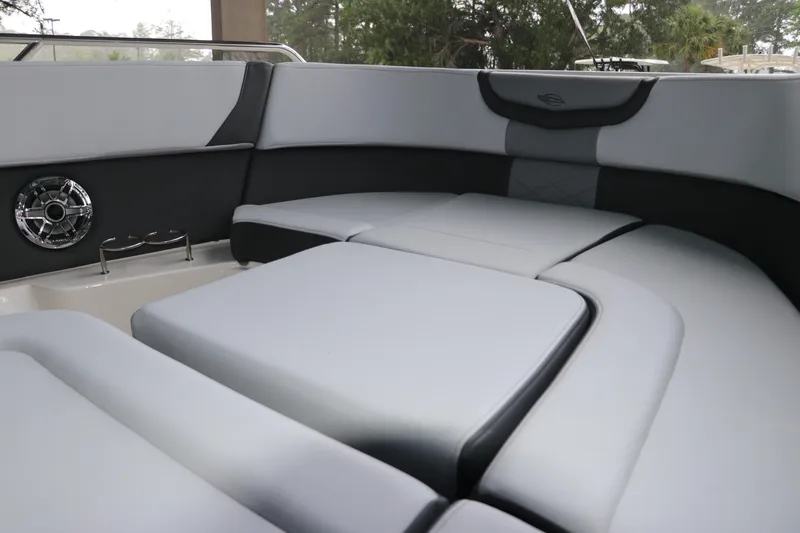 Slide: The Image of 2025 Chaparral 280 OSX boat interior with sleek gray seating and modern design. - 48