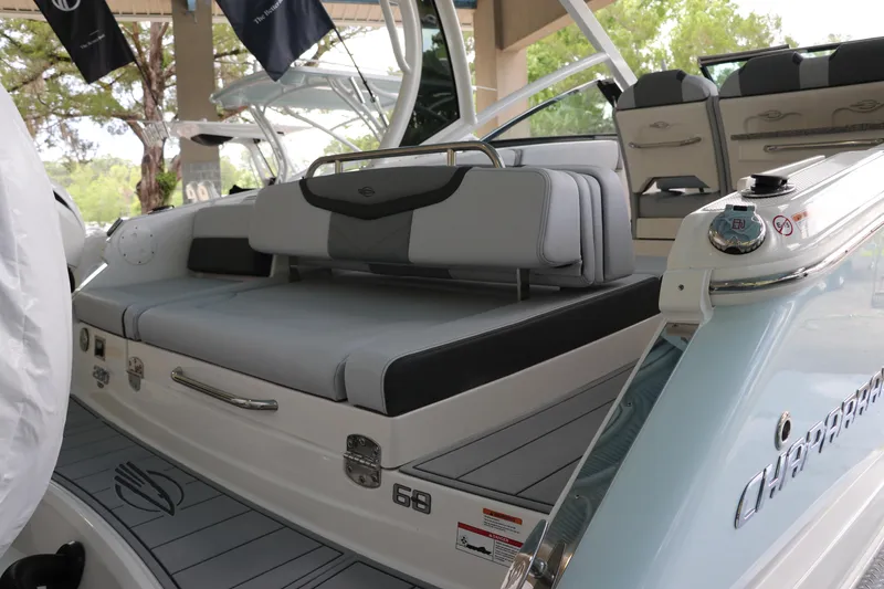 Slide: The Image of 2025 Chaparral 280 OSX boat interior with sleek seating and modern design. - 7