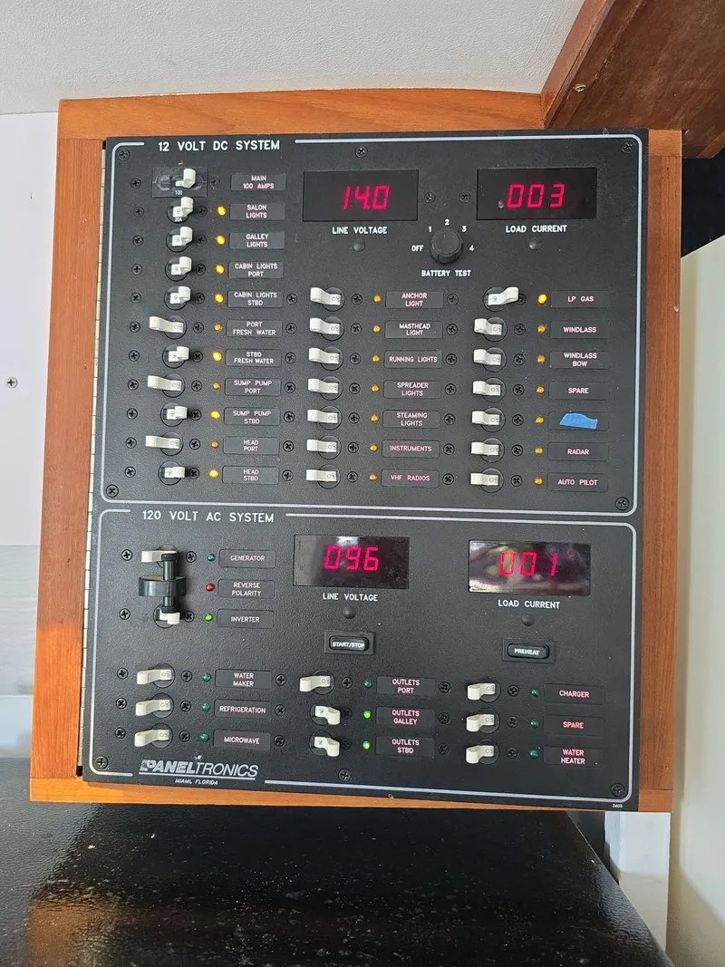 Slide: The Image of Electrical control panel display on a 1972 Custom 53 Catamaran. - 49