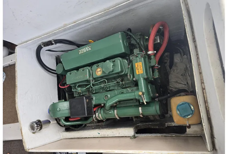 Slide: The Image of Volvo Penta engine in a 1972 Custom 53 Catamaran, showcasing marine engineering. - 52