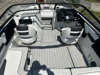 Slide: The Image of 2025 Yamaha Boats 195S interior with sleek seating and modern dashboard design. - 4