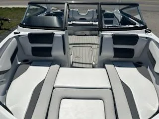 Slide: The Image of 2025 Yamaha Boats 195S interior, featuring sleek seating and modern design. - 6