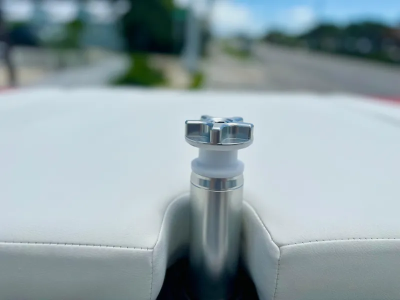 Slide: The Image of Stainless steel fitting on 2023 MasterCraft NXT24 boat upholstery. - 20