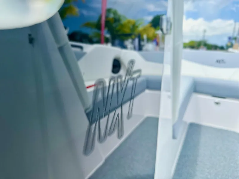 Slide: The Image of 2023 MasterCraft NXT24 boat interior with sleek design and modern features. - 32