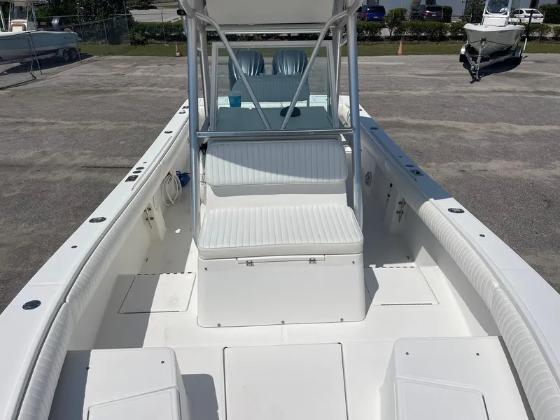 Slide: The Image of 2007 Regulator 26 Forward Seating boat with spacious deck and seating area. - 17