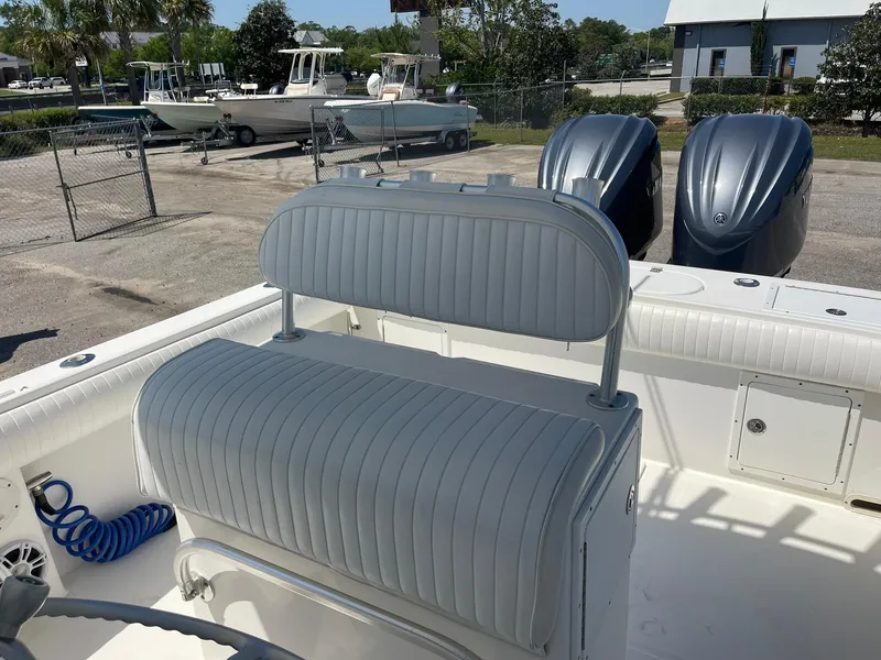 Slide: The Image of 2007 Regulator 26 Forward Seating boat with dual engines and cushioned seating. - 21