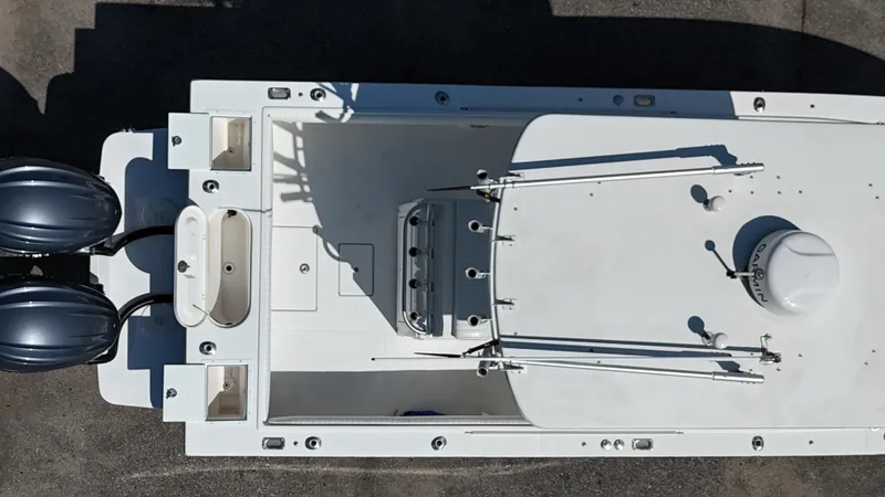 Slide: The Image of Aerial view of a 2007 Regulator 26 Forward Seating boat with dual outboard motors. - 26