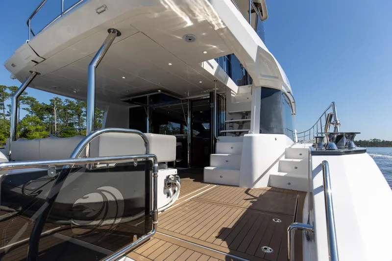 Slide: The Image of Aquila 54 Yacht 2022, luxurious deck view with modern design and sleek finishes. - 15