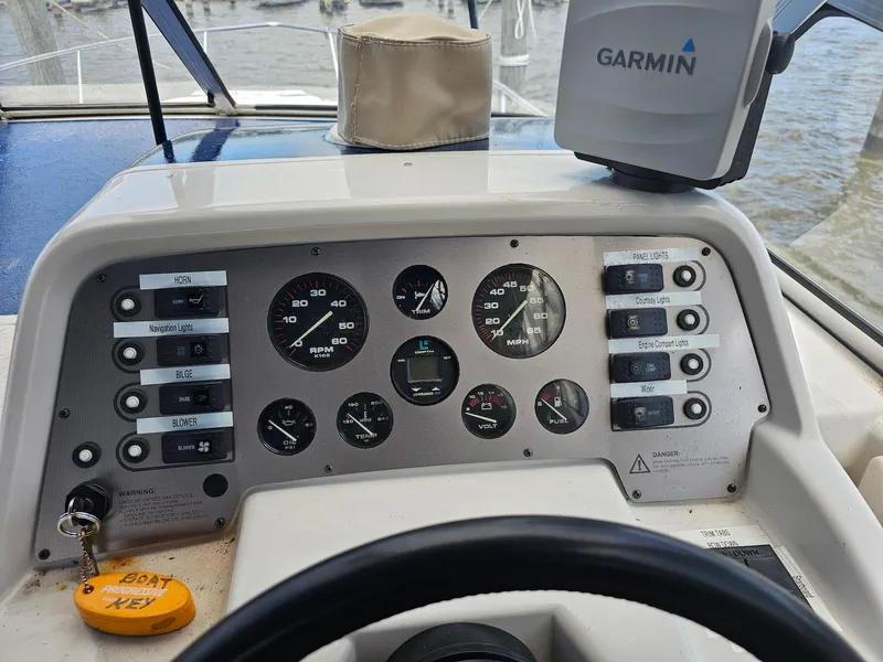 Slide: The Image of Control panel of a 1995 Monterey 246 SEL cruiser with Garmin navigation system. - 6