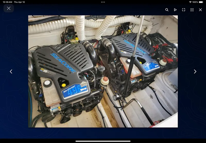 Slide: The Image of Twin MerCruiser engines in a 2008 Rinker 400 Express Cruiser engine room. - 25