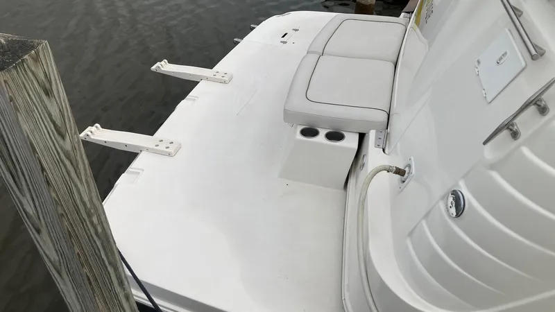 Slide: The Image of 2008 Rinker 400 Express Cruiser swim platform with seating and cup holders. - 3